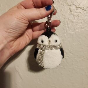 Penguin pocketback holder